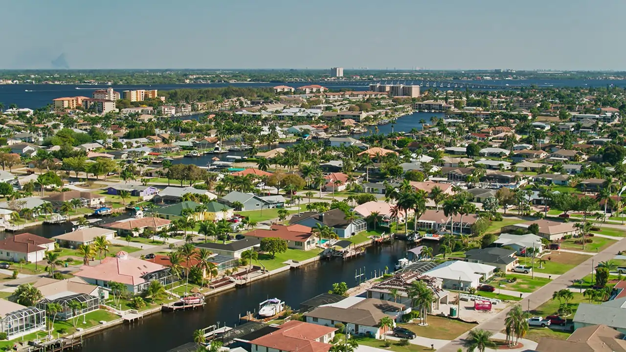 Cape Coral Canal Community Aerial view of residential canals and houses in Cape Coral, Florida.