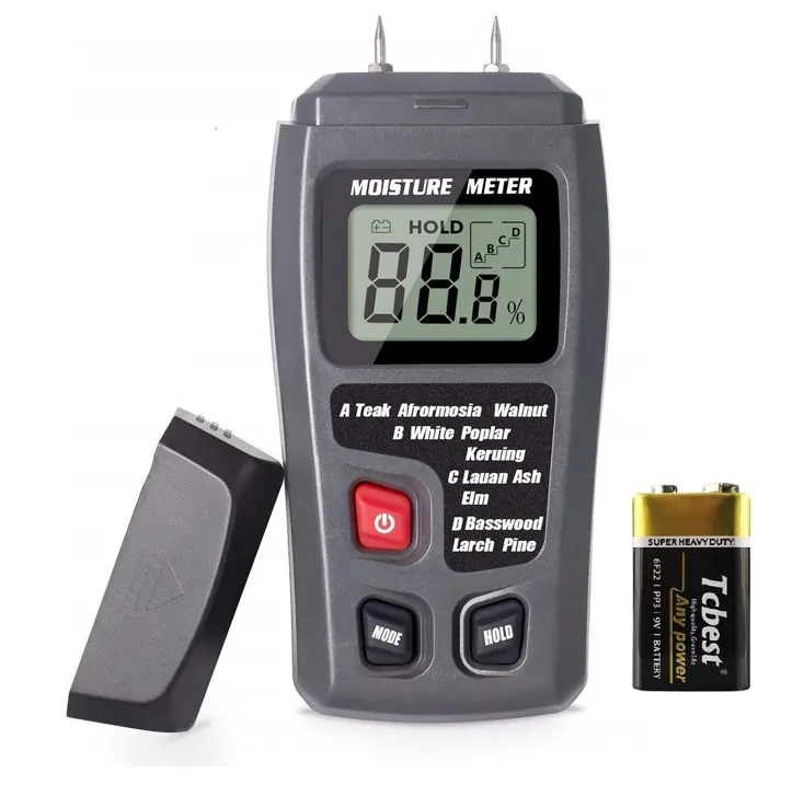 Giza Roofing Solutions professional using a digital moisture meter on a wooden roof deck or beam during a roof inspection.
